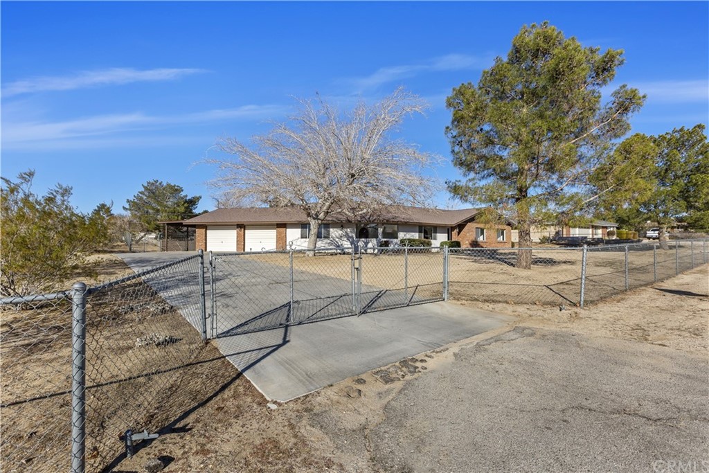 19150 Seneca Road Apple Valley, CA 92307 - Photo 1 of 1 a view of a yard