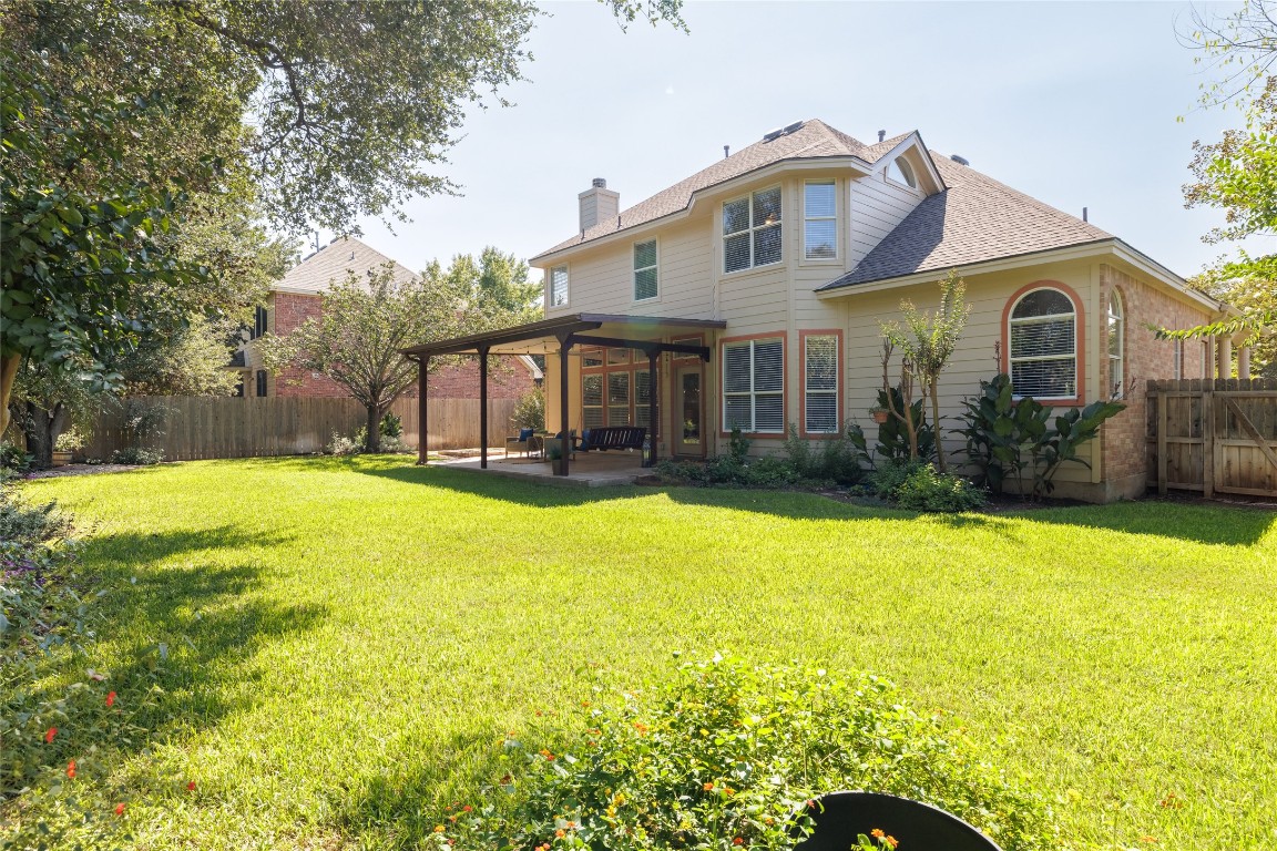 205 Ridge Run Court Georgetown, TX 78628 - Photo 12 of 40 a front view of house with yard and swimming pool