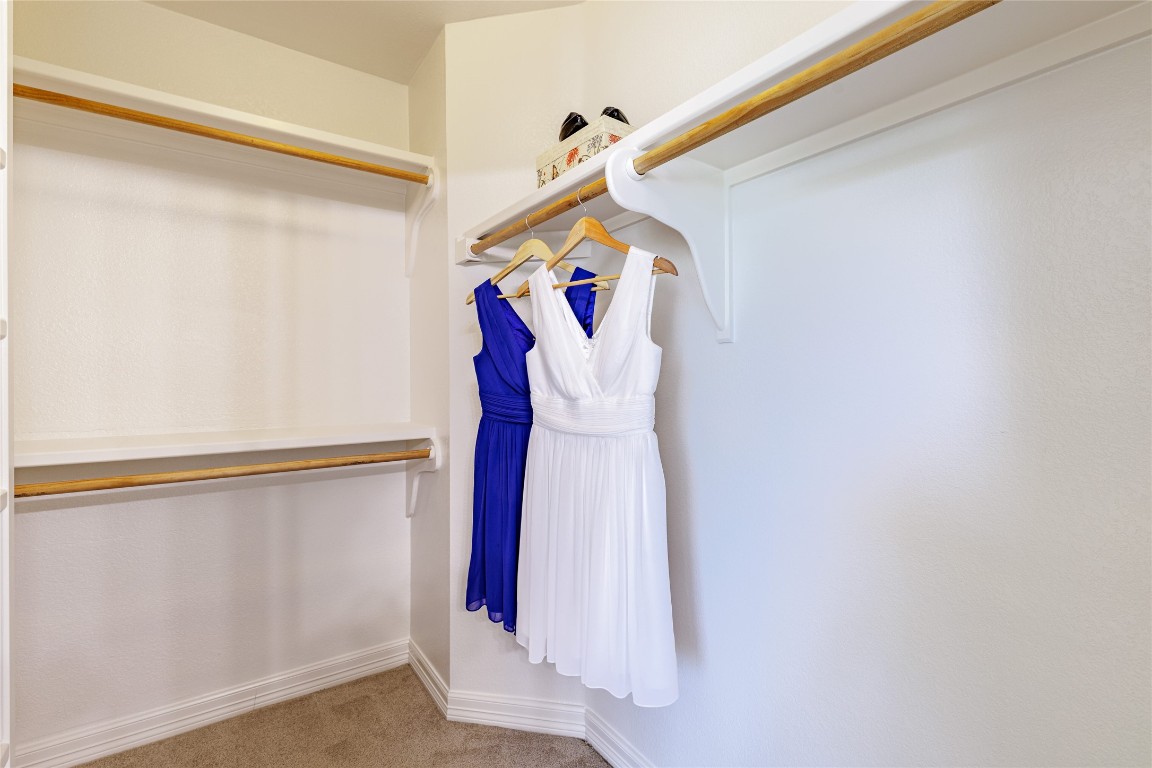 205 Ridge Run Court Georgetown, TX 78628 - Photo 30 of 40 a view of walk in closet with clothes and shoes