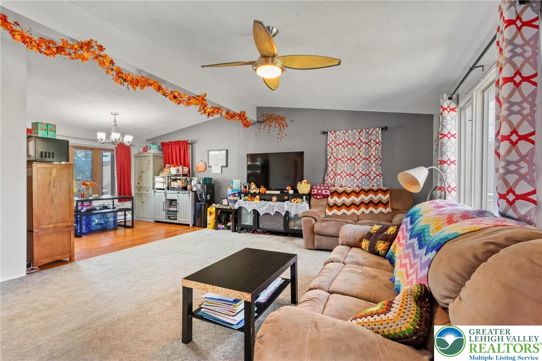 4354 2nd Street Walnutport, PA 18088 - Photo 11 of 21 a living room with furniture and a flat screen tv