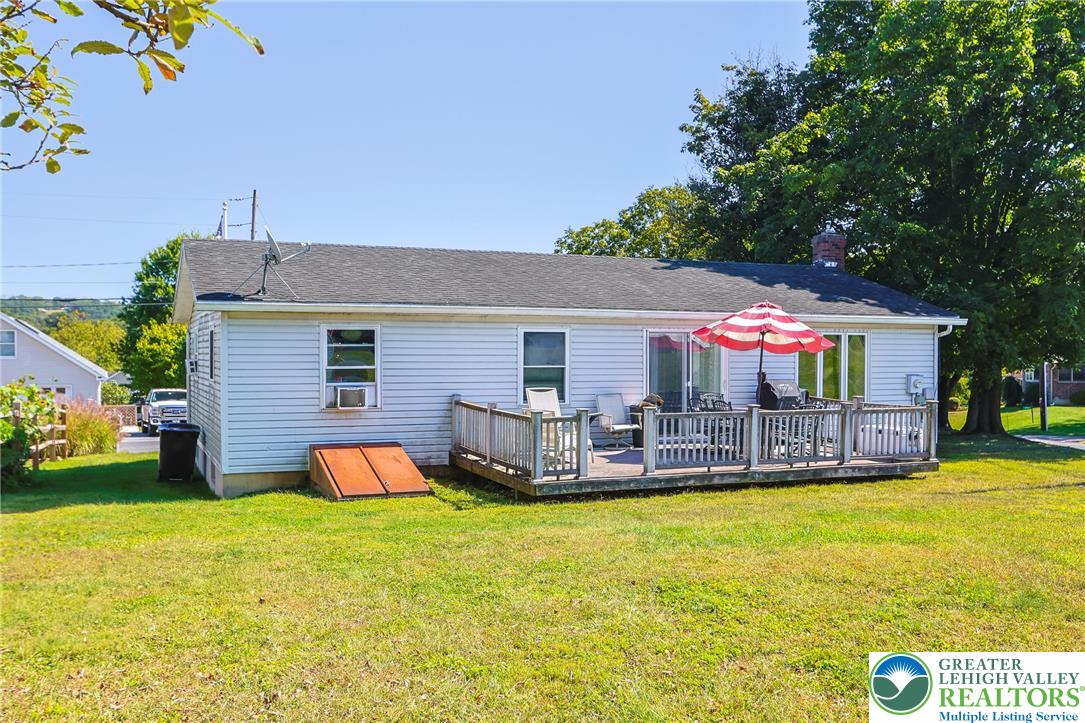 4354 2nd Street Walnutport, PA 18088 - Photo 20 of 21 a view of a house with a poll and yard