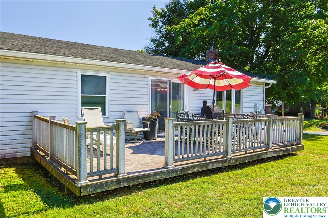 4354 2nd Street Walnutport, PA 18088 - Photo 21 of 21 a view of a house with wooden deck and a yard