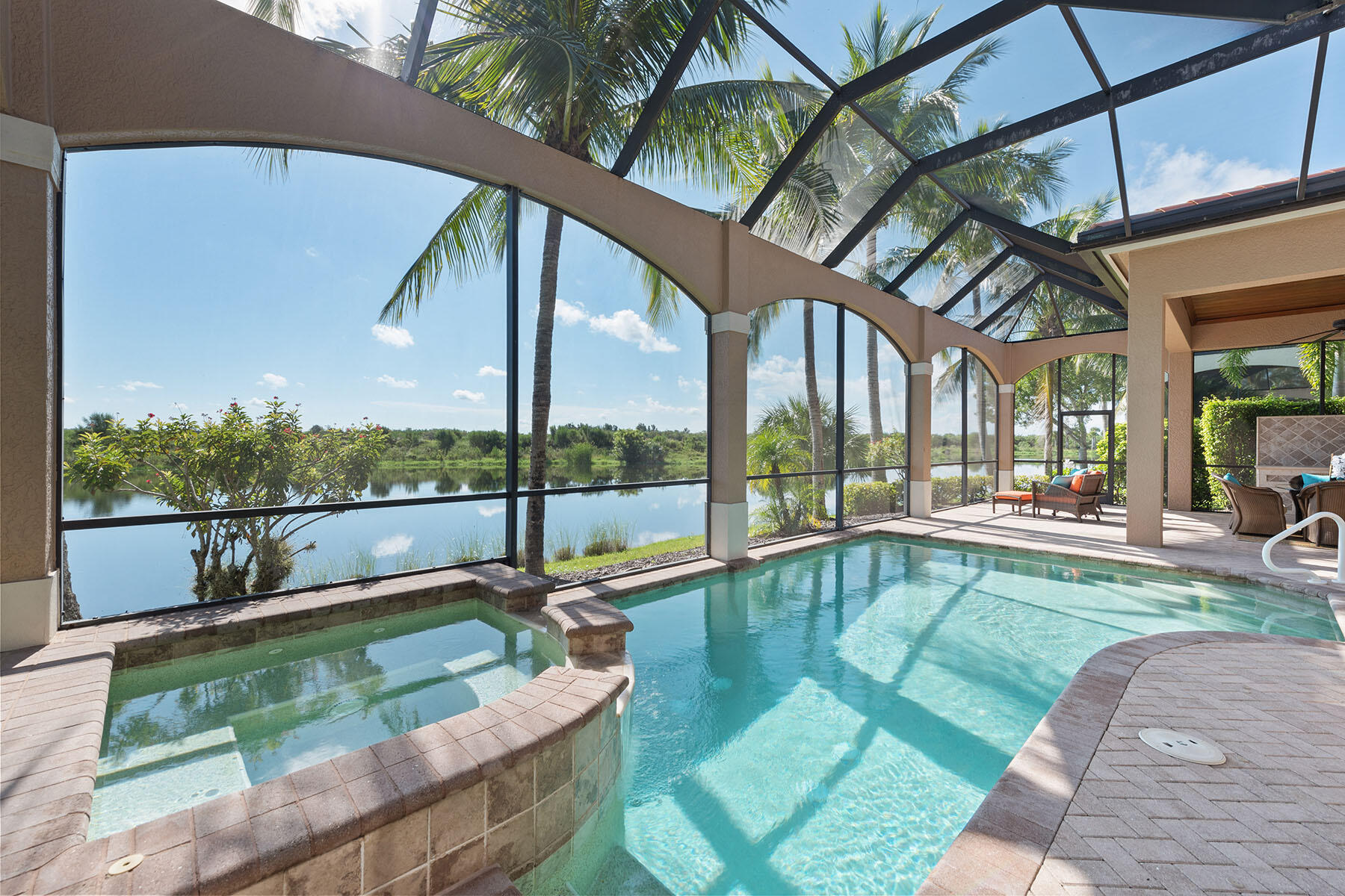8528 Bellagio Drive Naples, FL 34114 - Photo 1 of 50 a view of swimming pool with patio and a yard