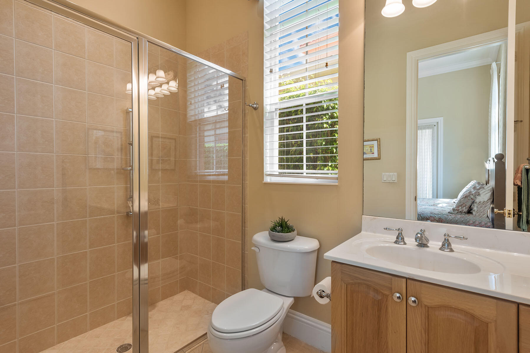 8528 Bellagio Drive Naples, FL 34114 - Photo 14 of 50 a bathroom with a sink a toilet and shower