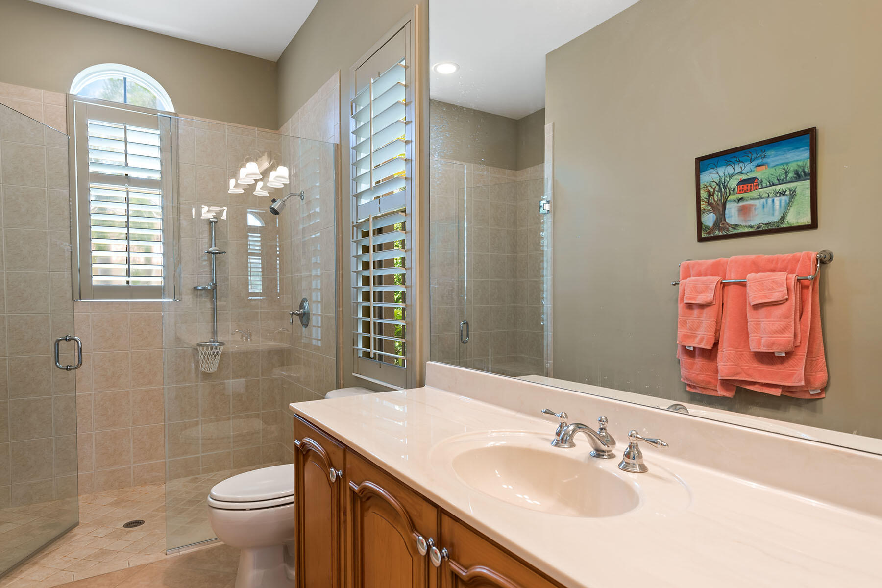 8528 Bellagio Drive Naples, FL 34114 - Photo 16 of 50 a bathroom with a sink a toilet and shower