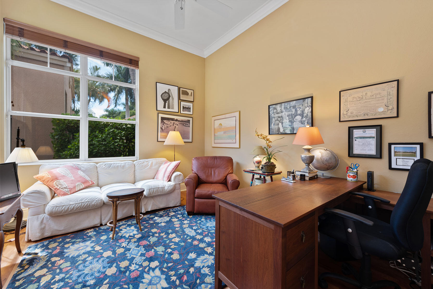 8528 Bellagio Drive Naples, FL 34114 - Photo 20 of 50 a living room with furniture and a large window