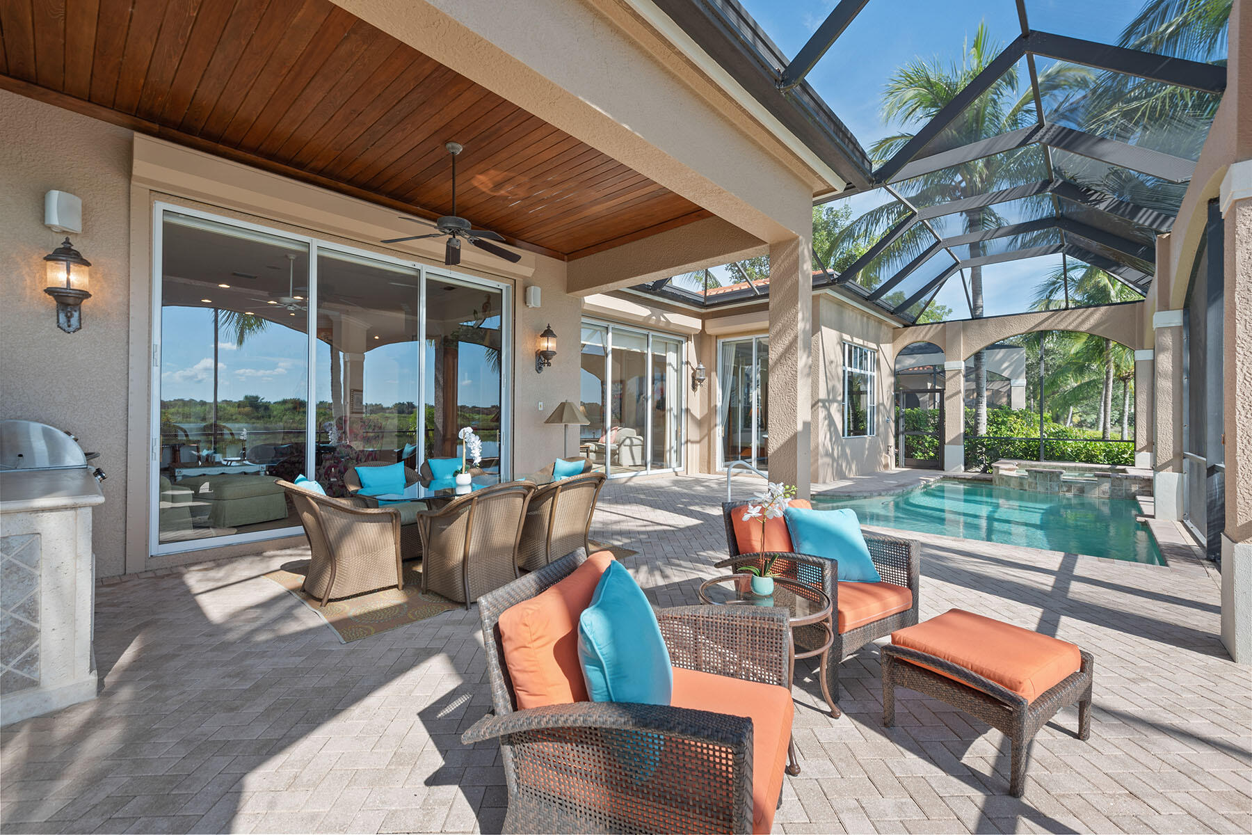 8528 Bellagio Drive Naples, FL 34114 - Photo 24 of 50 a outdoor space with patio the couches and a dining table with the garden view