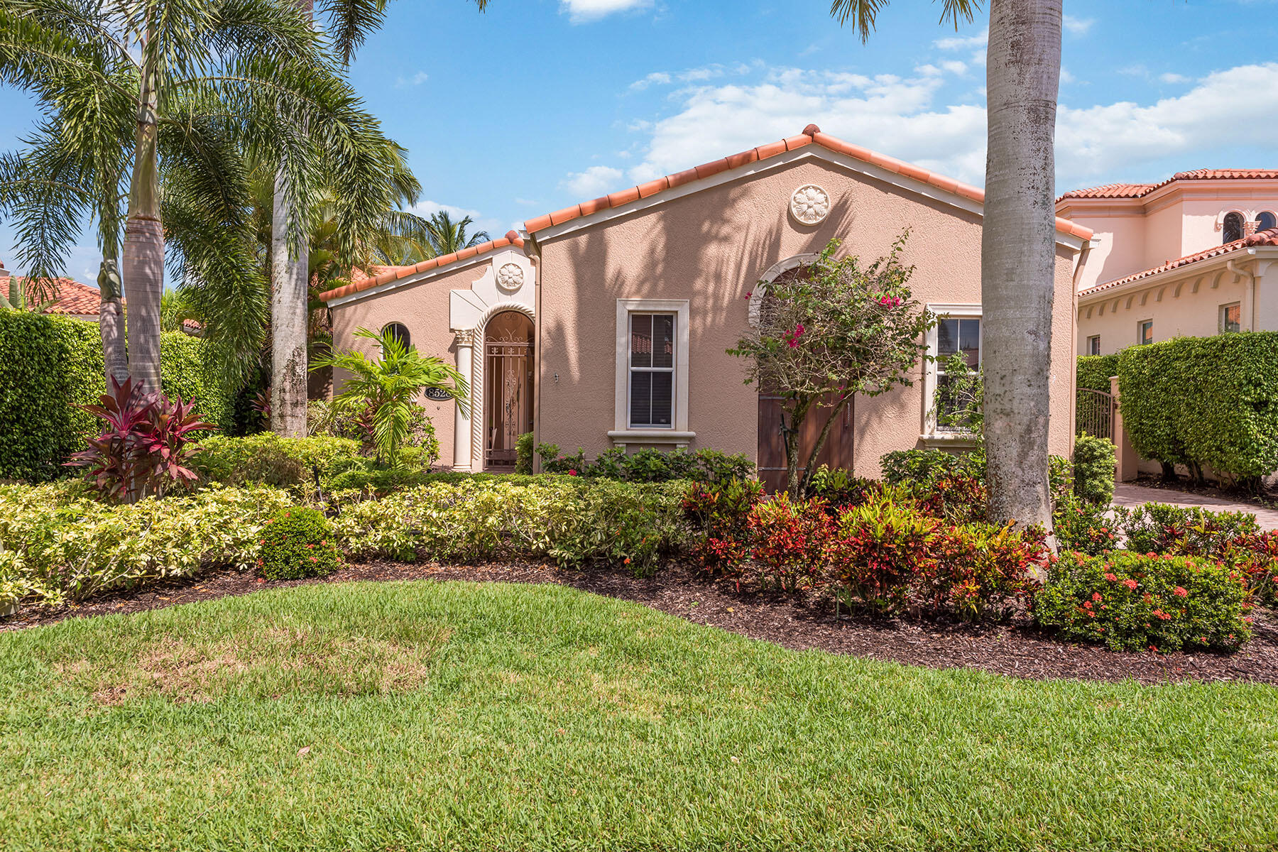 8528 Bellagio Drive Naples, FL 34114 - Photo 29 of 50 a front view of a house with a yard