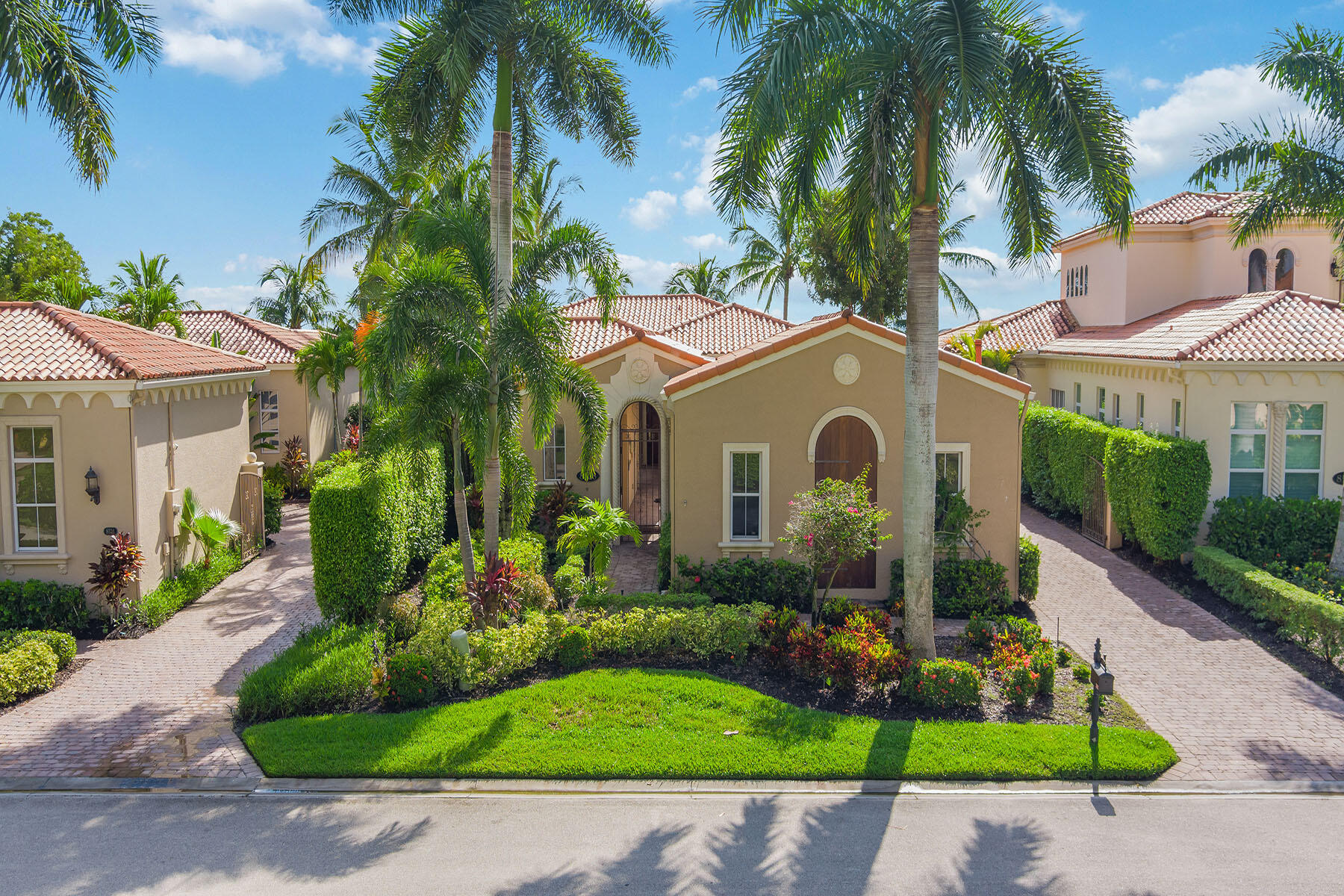 8528 Bellagio Drive Naples, FL 34114 - Photo 32 of 50 a front view of a house with garden