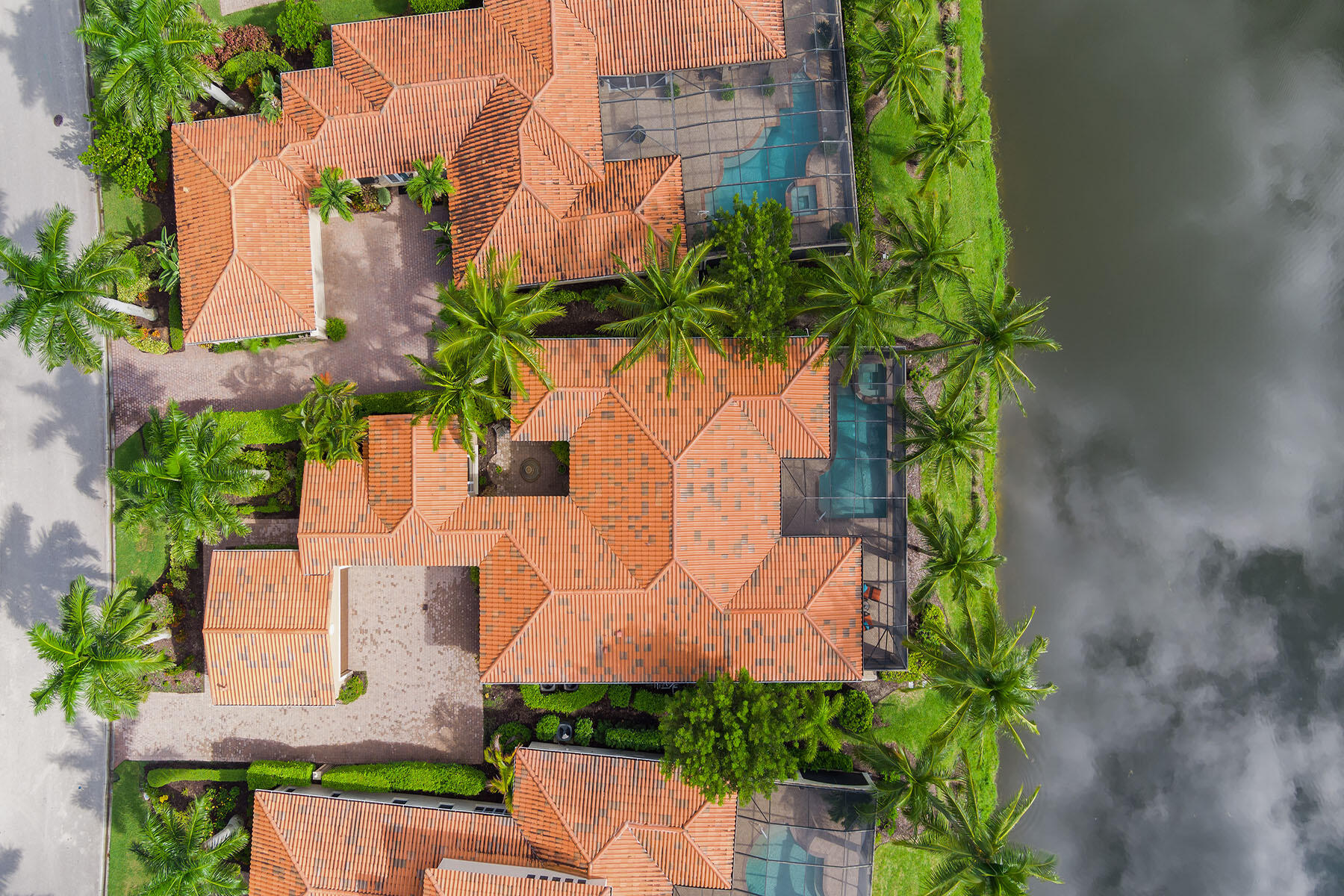 8528 Bellagio Drive Naples, FL 34114 - Photo 33 of 50 an aerial view of a house with a yard and garden