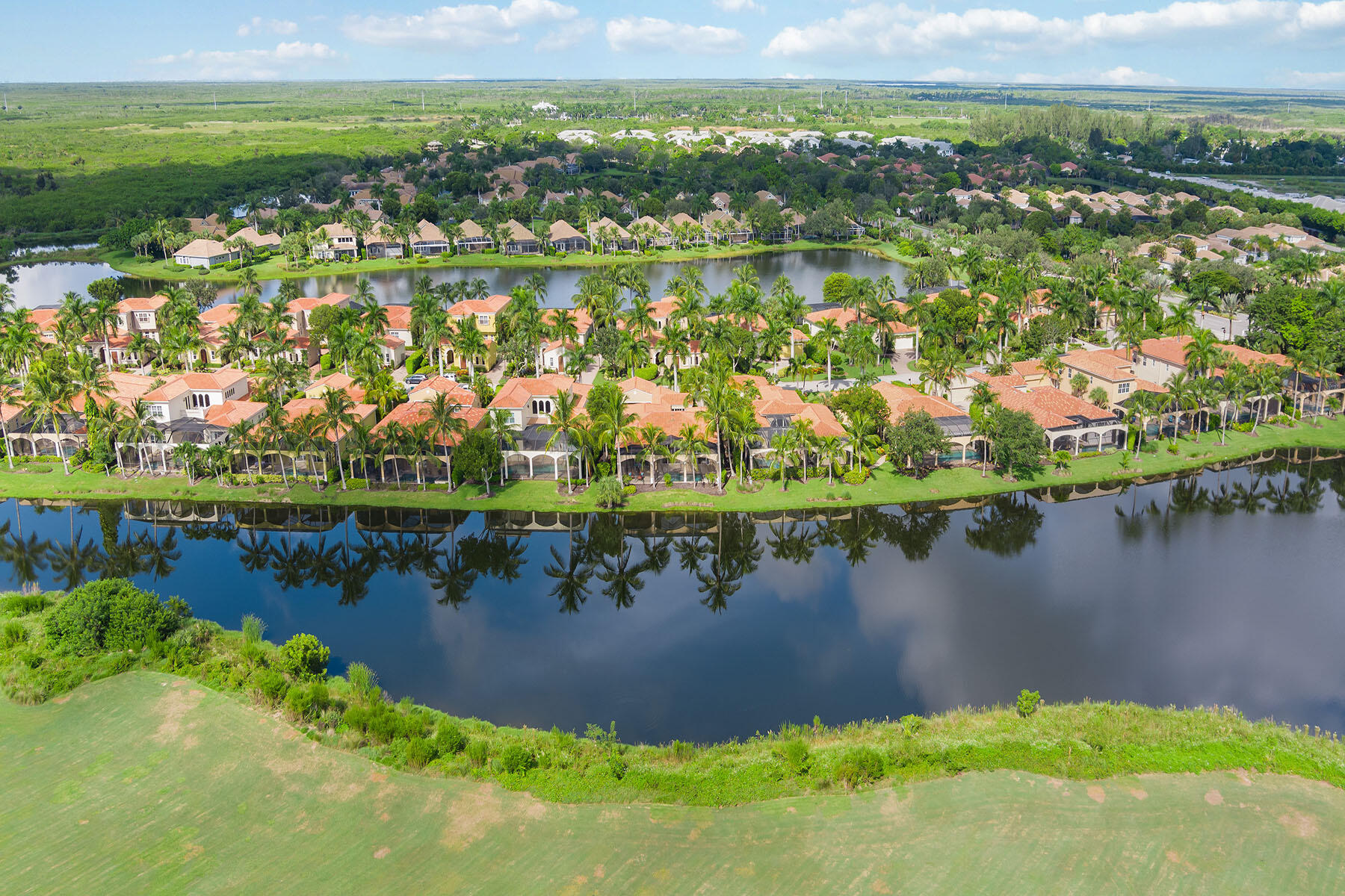 8528 Bellagio Drive Naples, FL 34114 - Photo 34 of 50 a view of a lake with a city