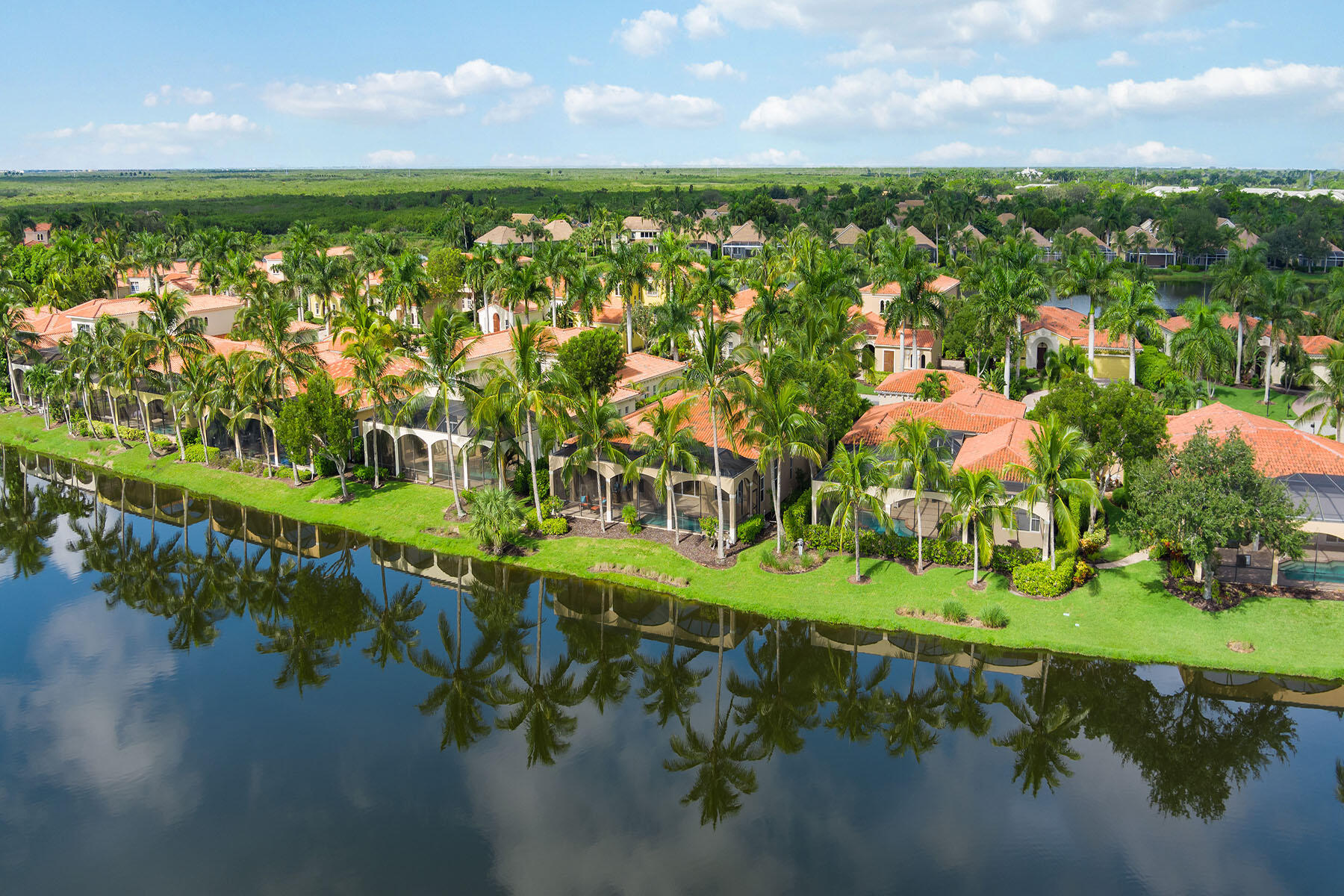 8528 Bellagio Drive Naples, FL 34114 - Photo 35 of 50 a view of a lake with houses