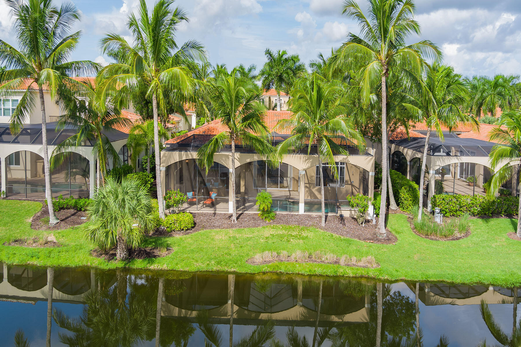 8528 Bellagio Drive Naples, FL 34114 - Photo 36 of 50 a view of an house with backyard and swimming pool