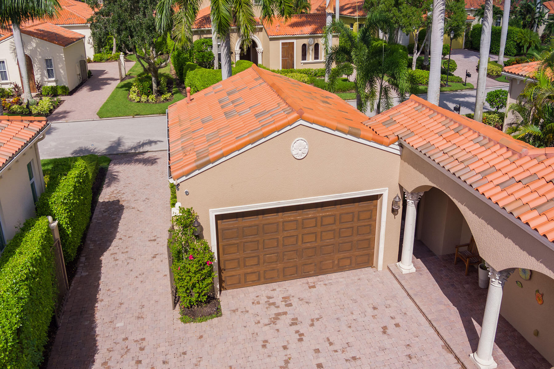 8528 Bellagio Drive Naples, FL 34114 - Photo 39 of 50 a front view of a house with garden