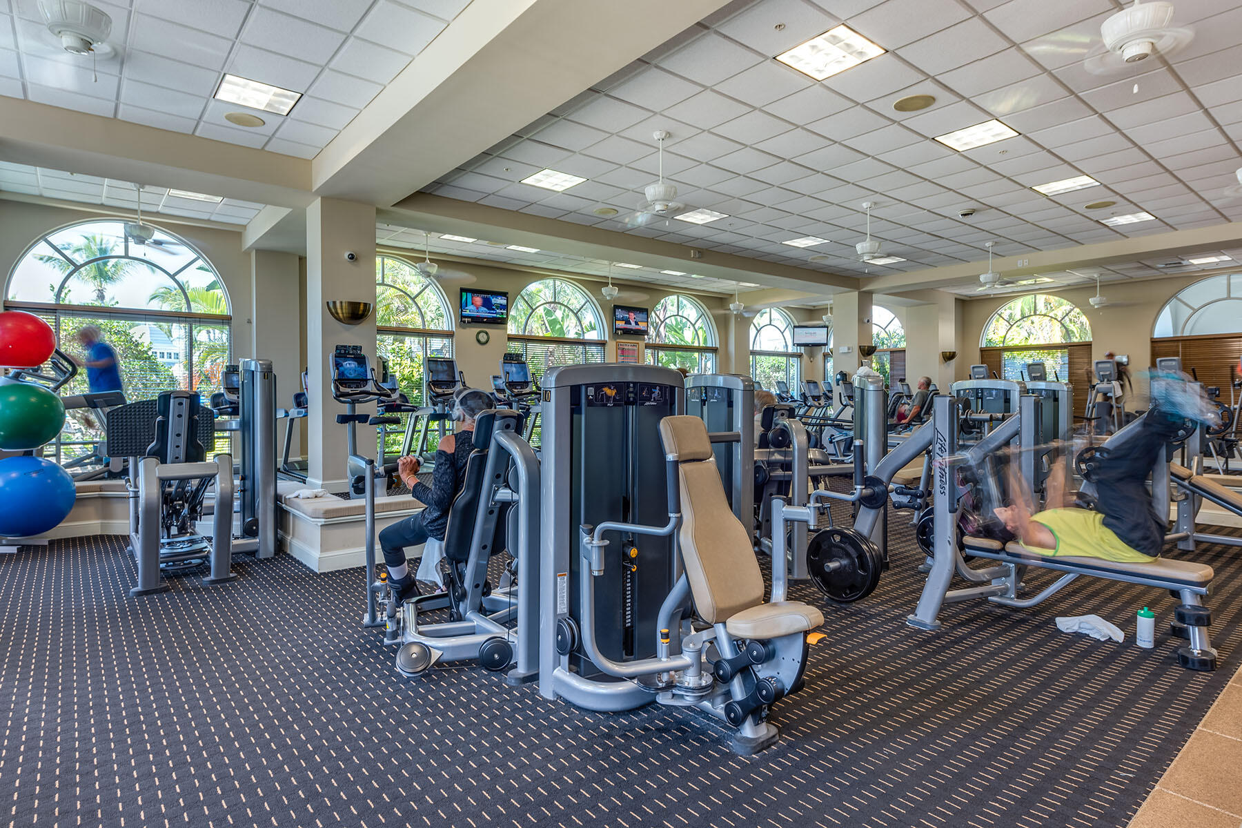 8528 Bellagio Drive Naples, FL 34114 - Photo 43 of 50 a view of a room with gym equipment