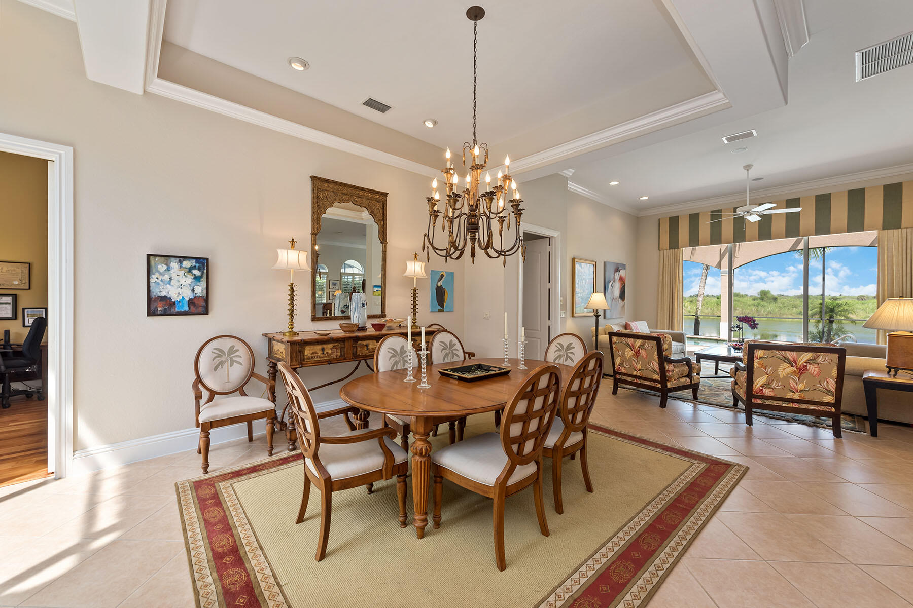 8528 Bellagio Drive Naples, FL 34114 - Photo 8 of 50 a view of a dining room with furniture window and wooden floor