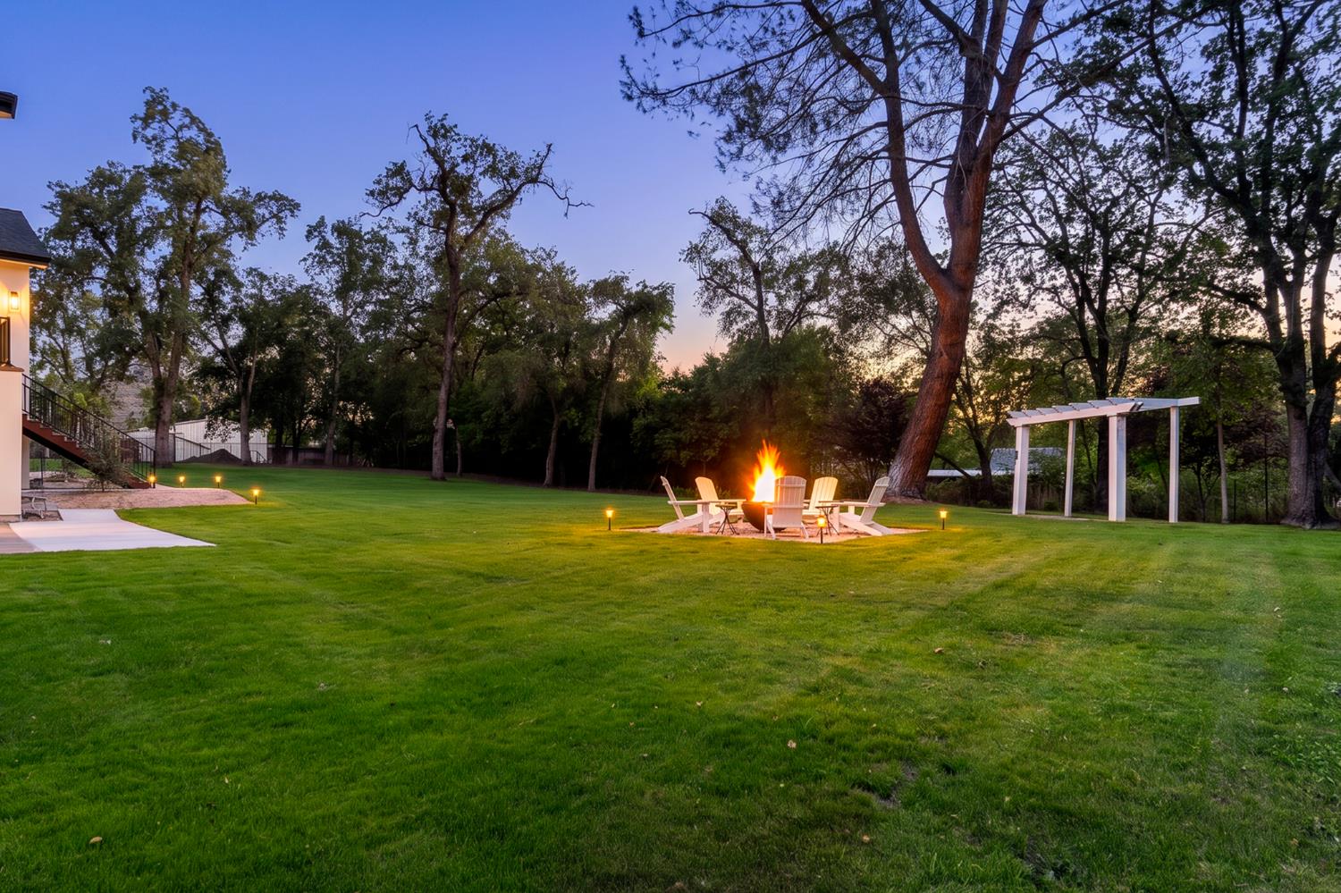 7697 Horseshoe Bar Road Loomis, CA 95650 - Photo 58 of 76 a view of a house with a big yard and a large trees