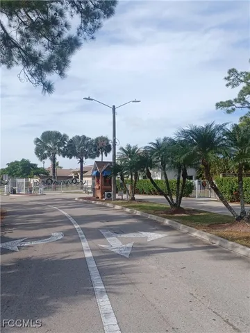front view of a building with a garden