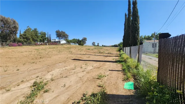 a view of a backyard of a house