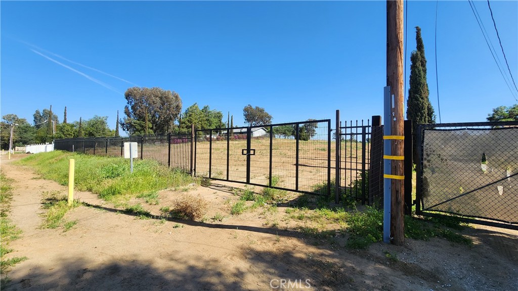 0 West Rider Street Perris, CA 92570 - Photo 6 of 19 a view of a garden with a building in the background