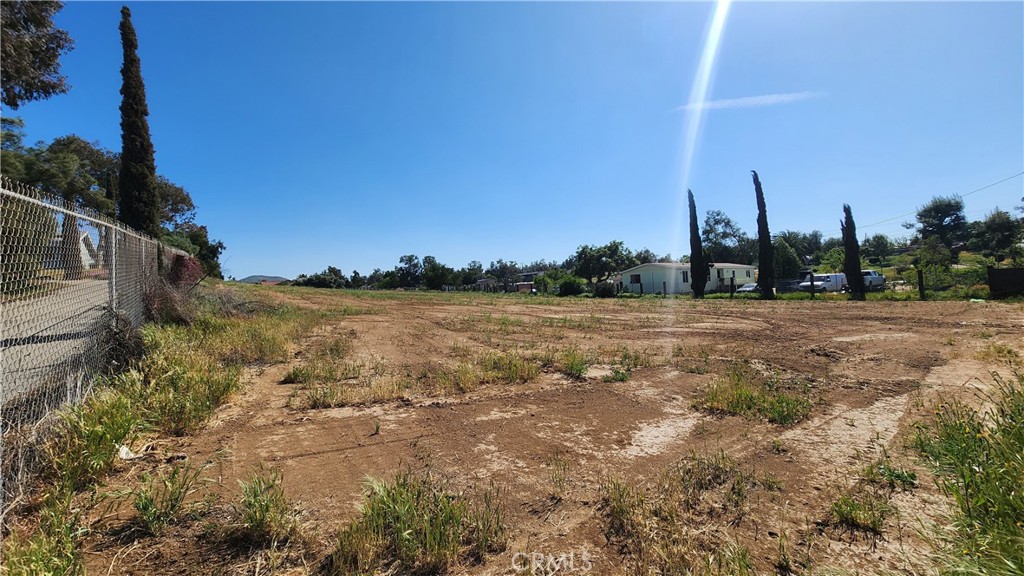 0 West Rider Street Perris, CA 92570 - Photo 9 of 19 a view of a lake with houses in the back