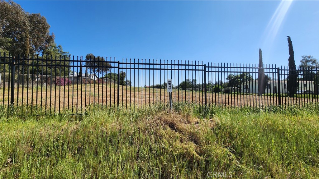 0 West Rider Street Perris, CA 92570 - Photo 10 of 19 a view of a wrought fence