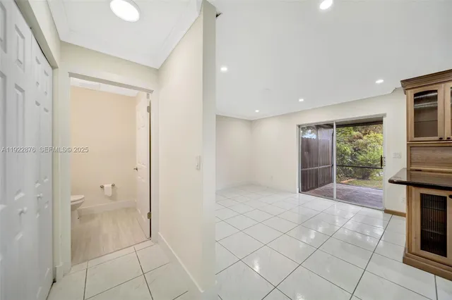 a view of a kitchen and dining room