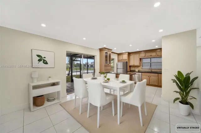 a kitchen with stainless steel appliances granite countertop a sink and stove top oven