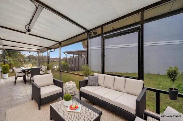 a view of outdoor space with sliding door