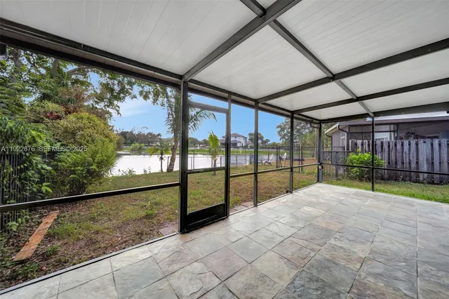 a view of a lake with a big yard