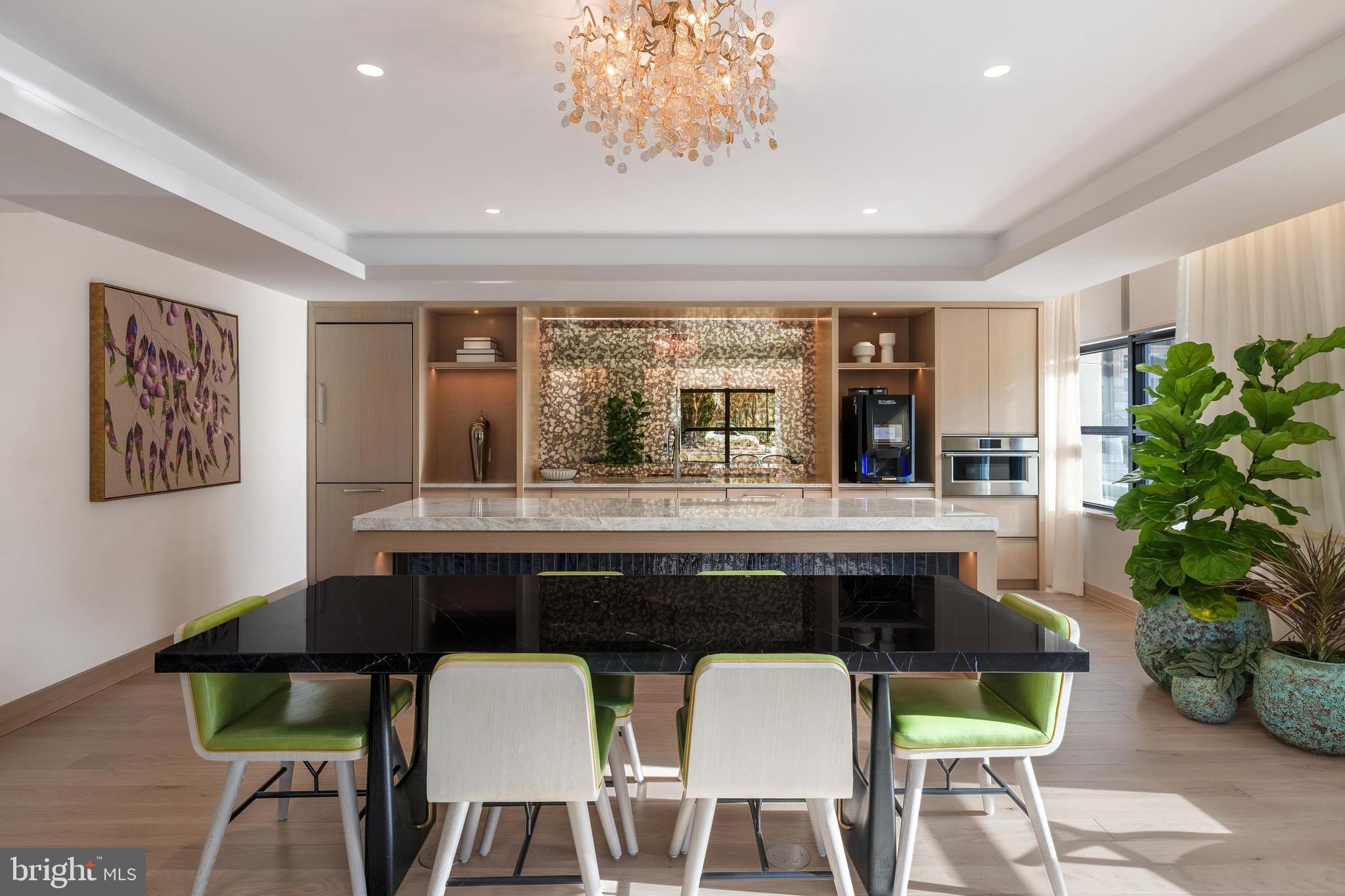 300 12th Street Southwest, Unit PH03 Washington, DC 20024 - Photo 8 of 28 a dining table with chairs and window