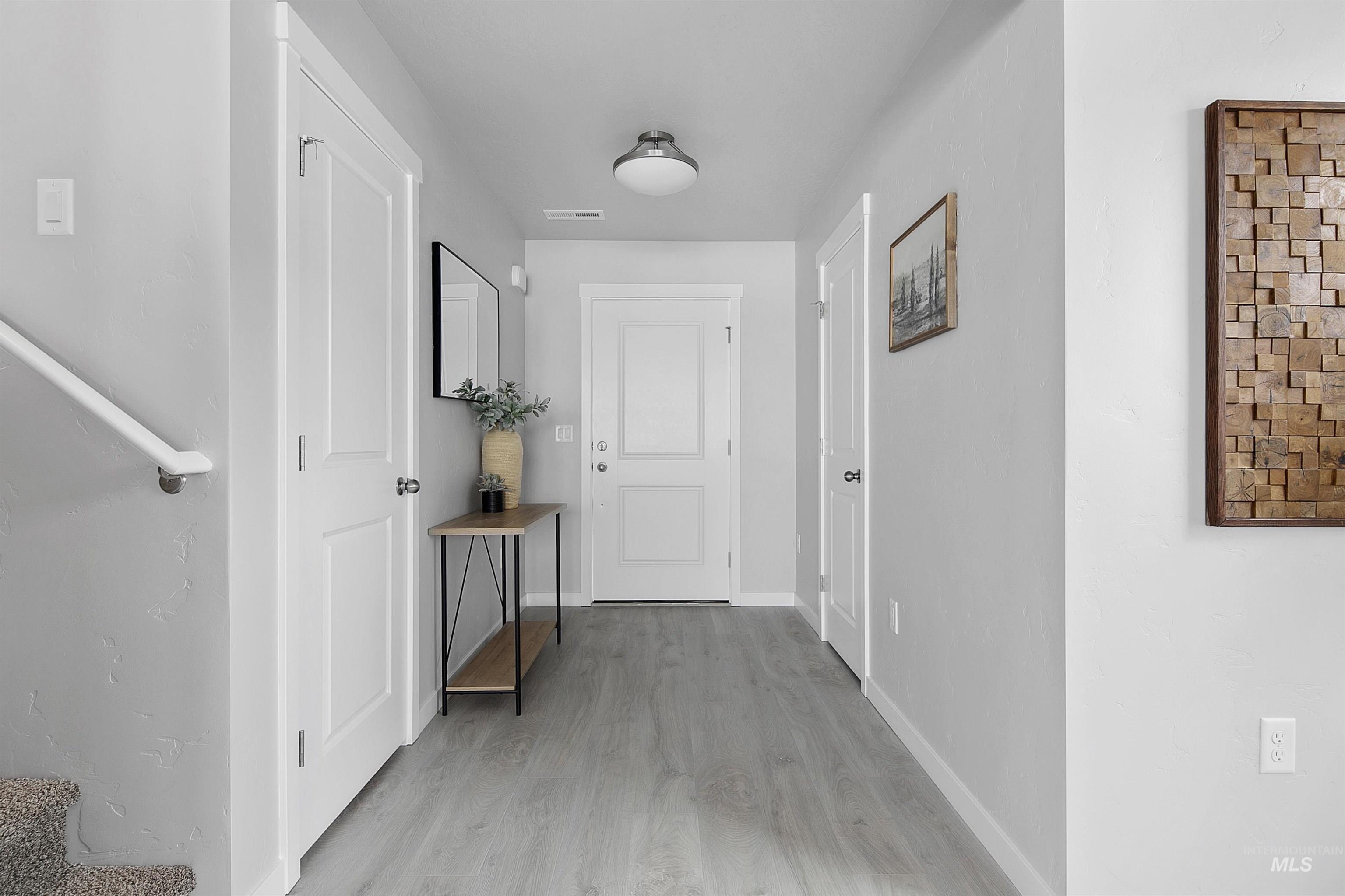 480 South Bobby Way Kuna, ID 83634 - Photo 7 of 9 Hall with light wood finished floors and baseboards