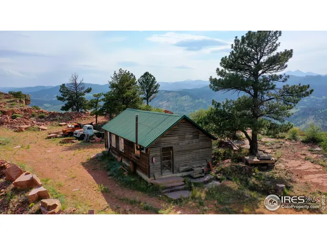 a balcony with furniture and city view