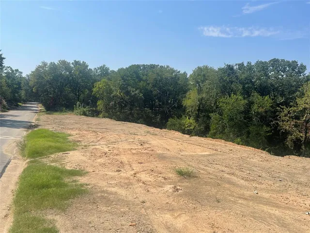 a view of a backyard of a house