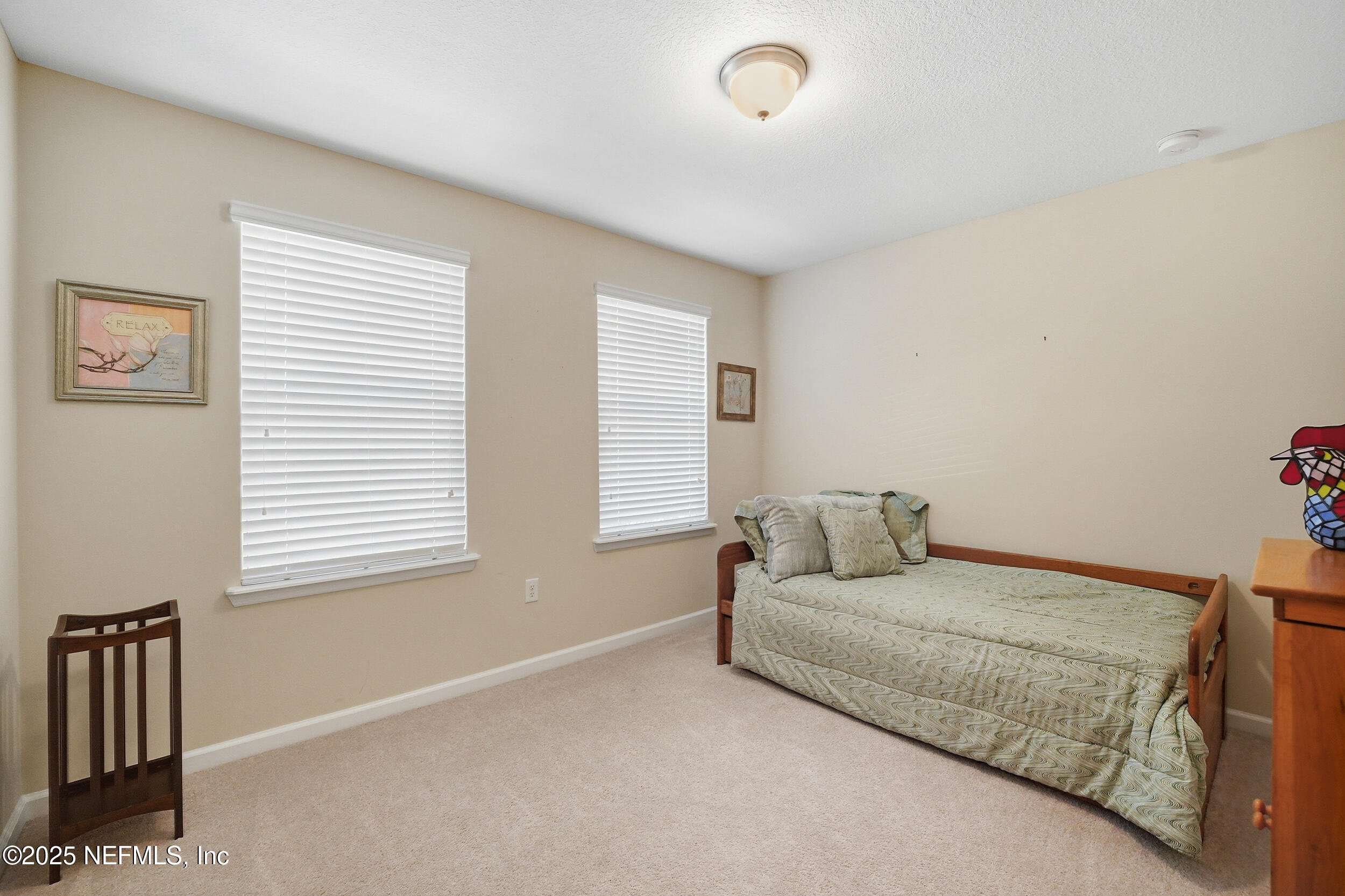 362 Paradas Place St. Augustine, FL 32092 - Photo 17 of 27 a living room with a couch and a window