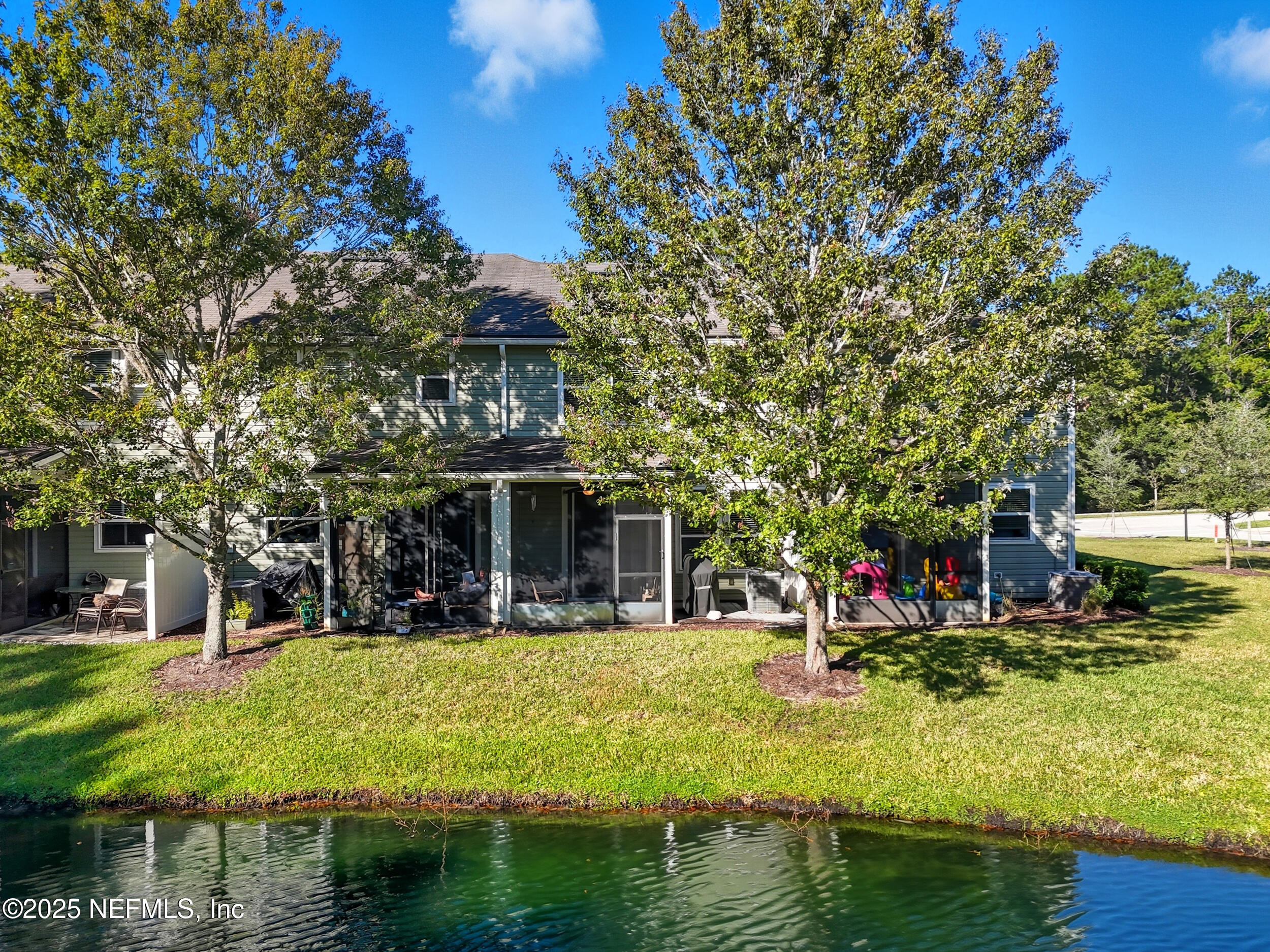362 Paradas Place St. Augustine, FL 32092 - Photo 24 of 27 a view of a house with swimming pool and sitting area