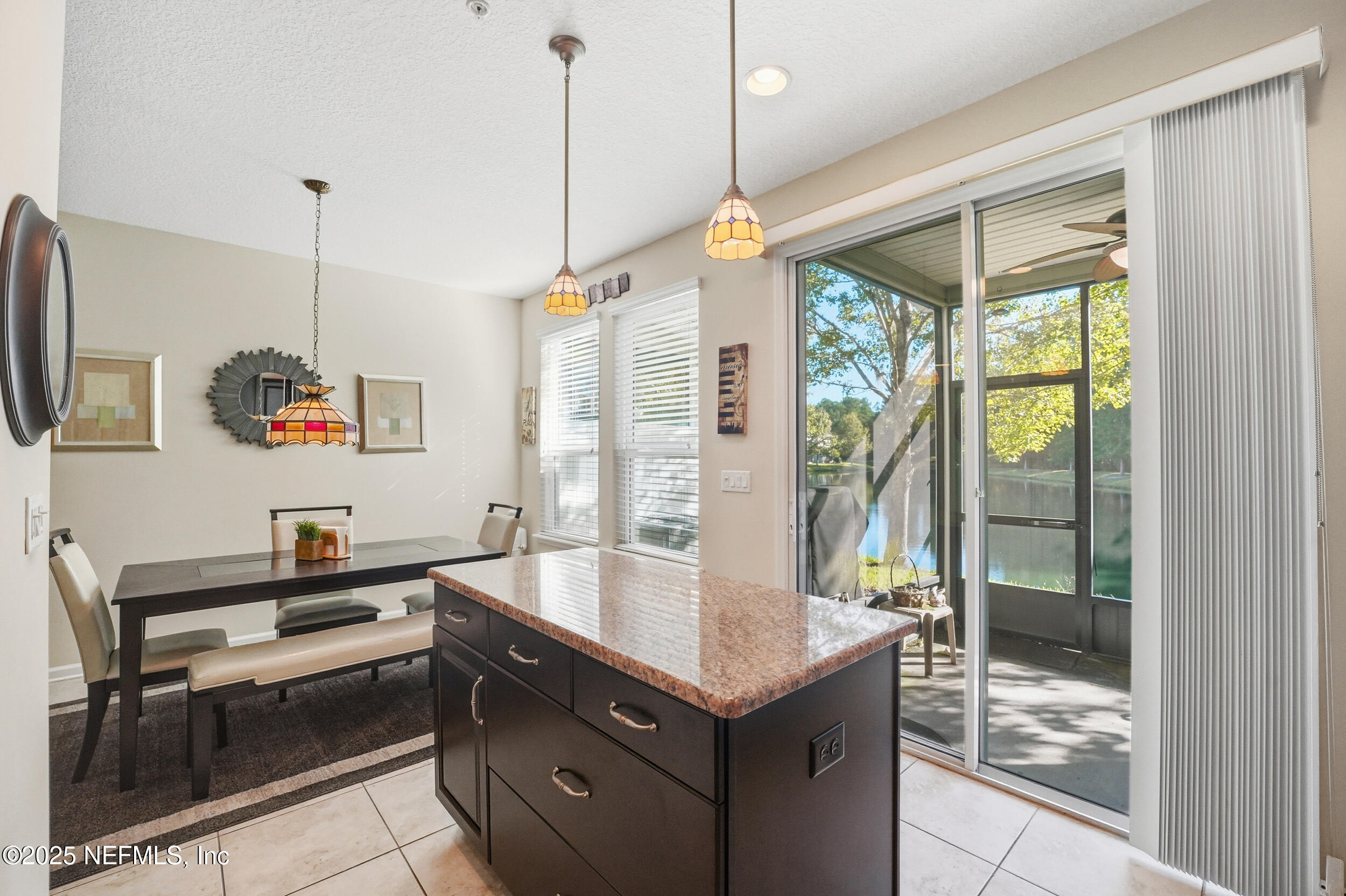 362 Paradas Place St. Augustine, FL 32092 - Photo 9 of 27 a kitchen with a refrigerator a sink and wooden floor
