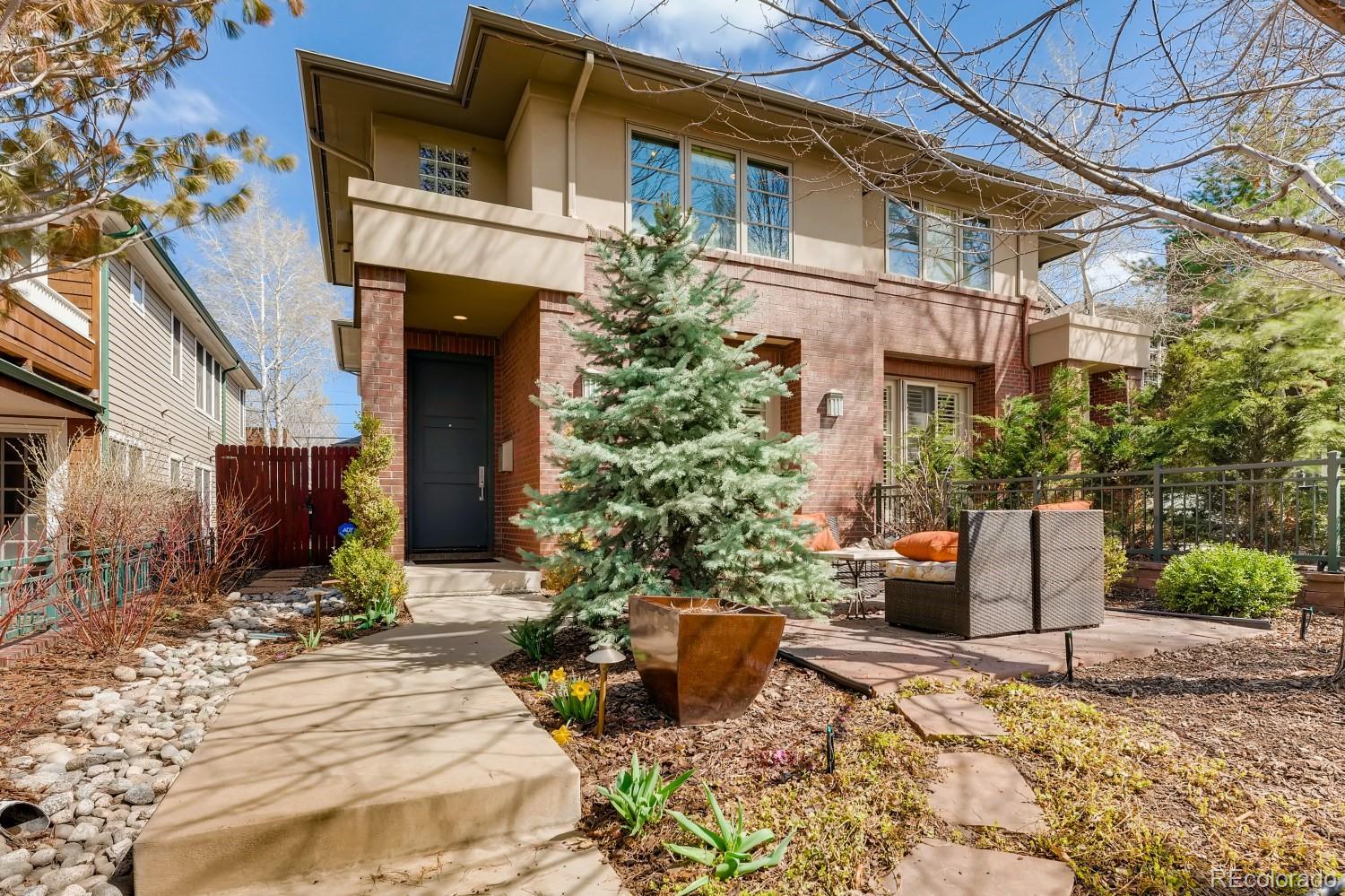 436 Jackson Street Denver, CO 80206 - Photo 2 of 40 a view of a house with potted plants