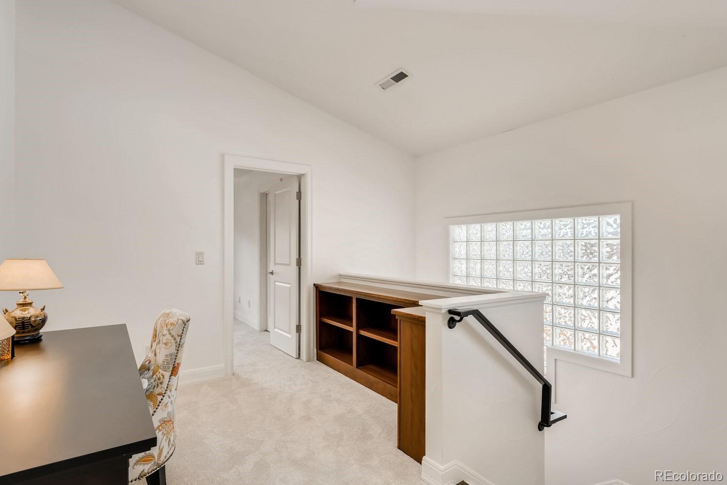 436 Jackson Street Denver, CO 80206 - Photo 28 of 40 a view of a workspace with furniture