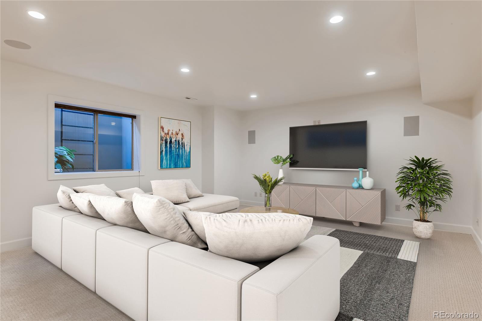 436 Jackson Street Denver, CO 80206 - Photo 30 of 40 a living room with furniture and a flat screen tv