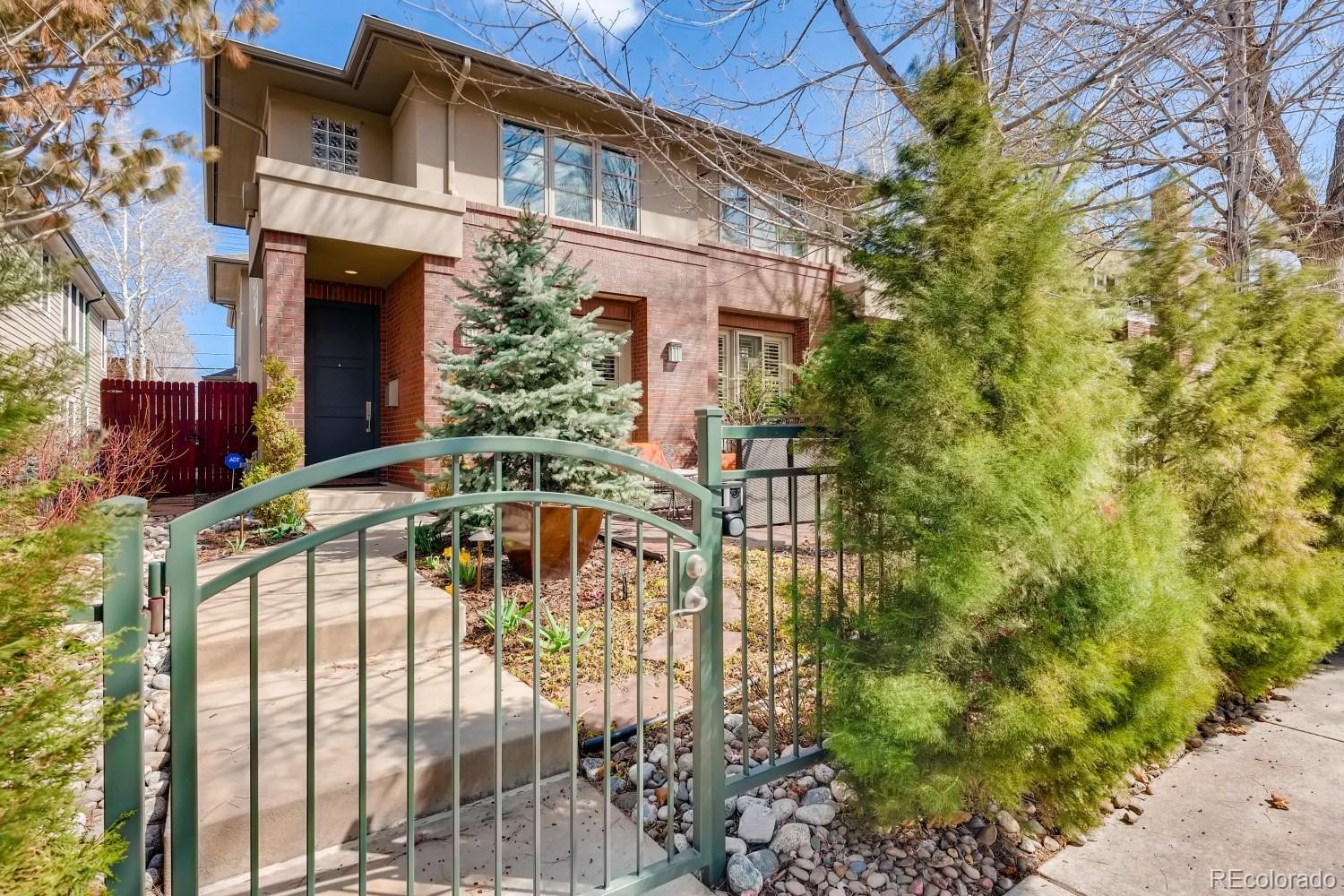 436 Jackson Street Denver, CO 80206 - Photo 3 of 40 a view of a building with a outdoor space