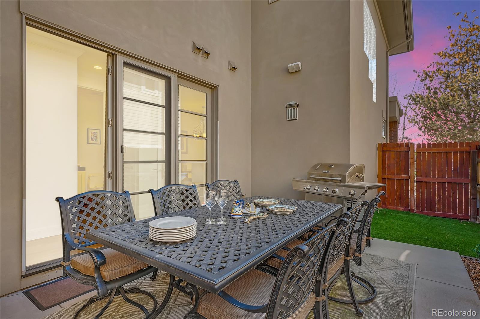 436 Jackson Street Denver, CO 80206 - Photo 35 of 40 a dining room with furniture and wooden floor