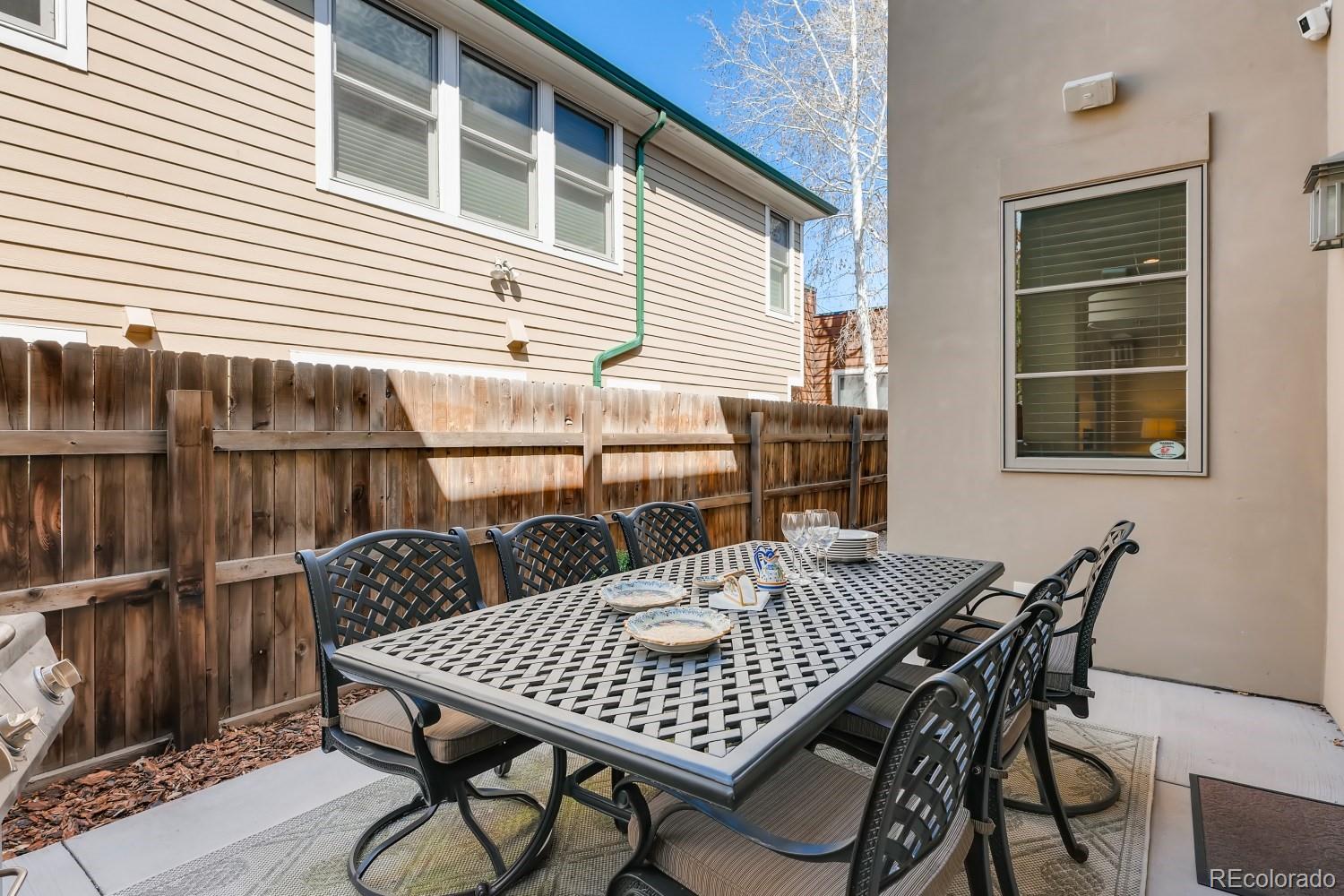 436 Jackson Street Denver, CO 80206 - Photo 37 of 40 a view of a roof deck with furniture