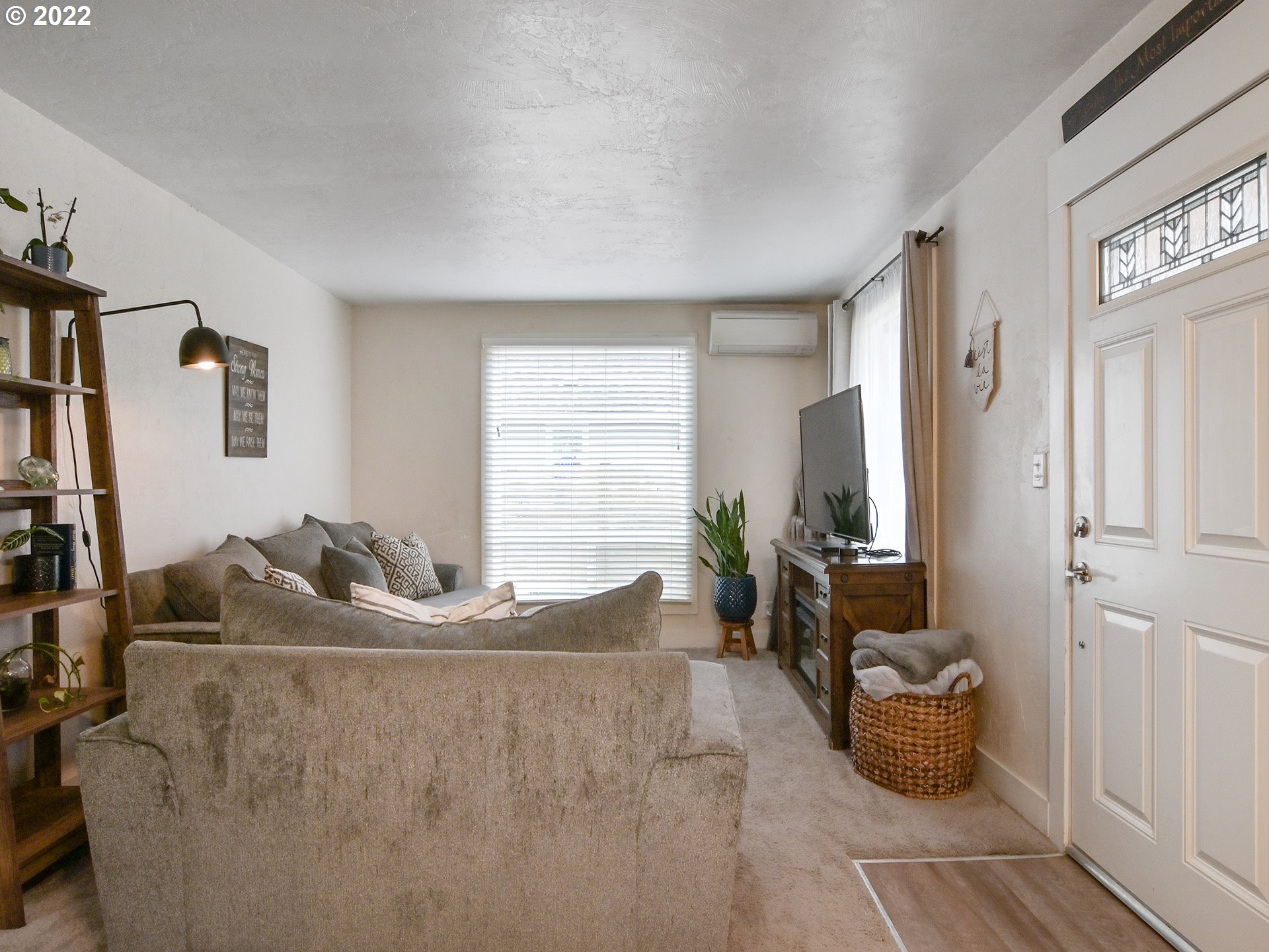 1704 H Street Springfield, OR 97477 - Photo 14 of 30 a bedroom with furniture and a window