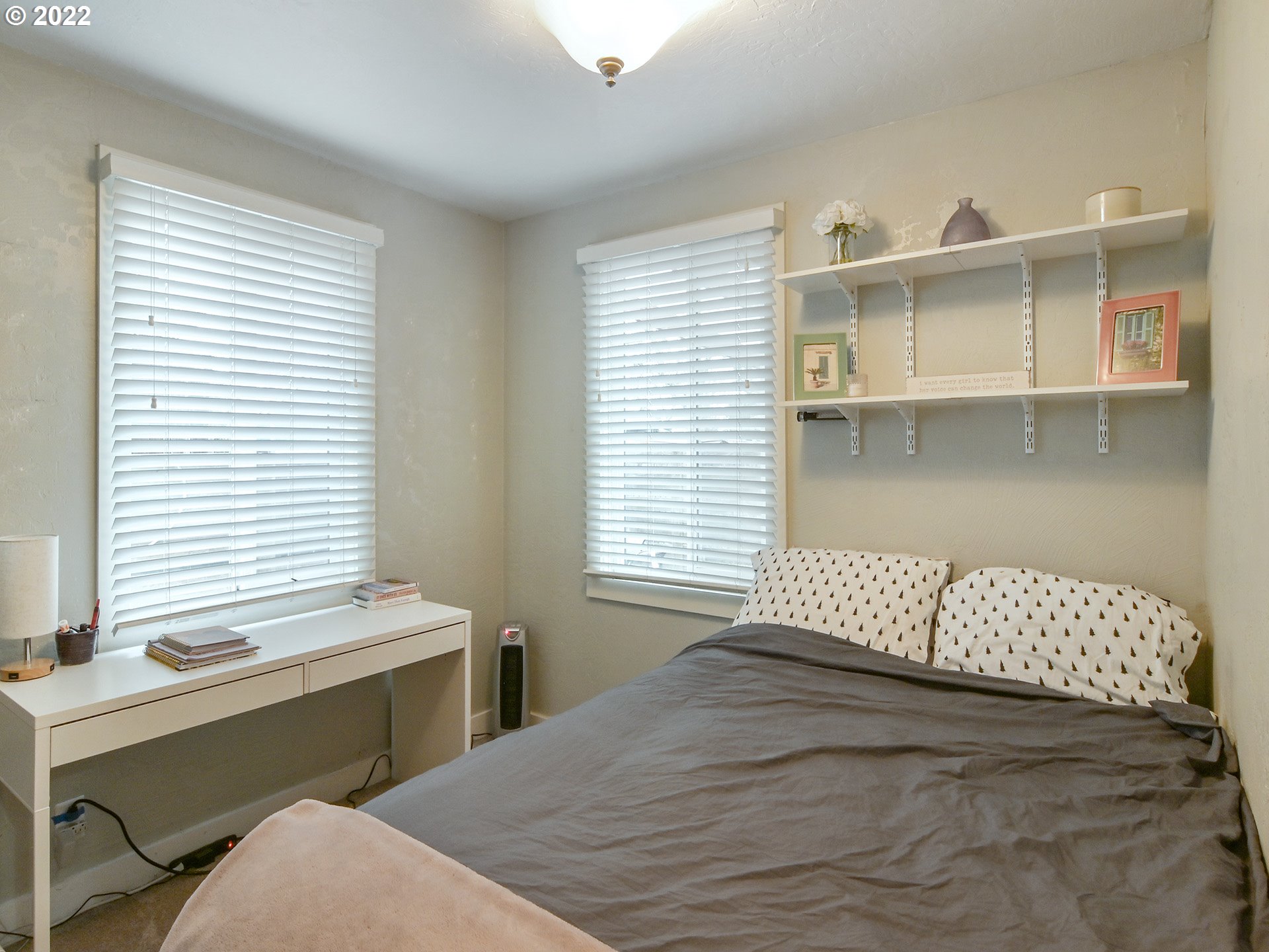 1704 H Street Springfield, OR 97477 - Photo 18 of 30 a bedroom with a large bed and a window