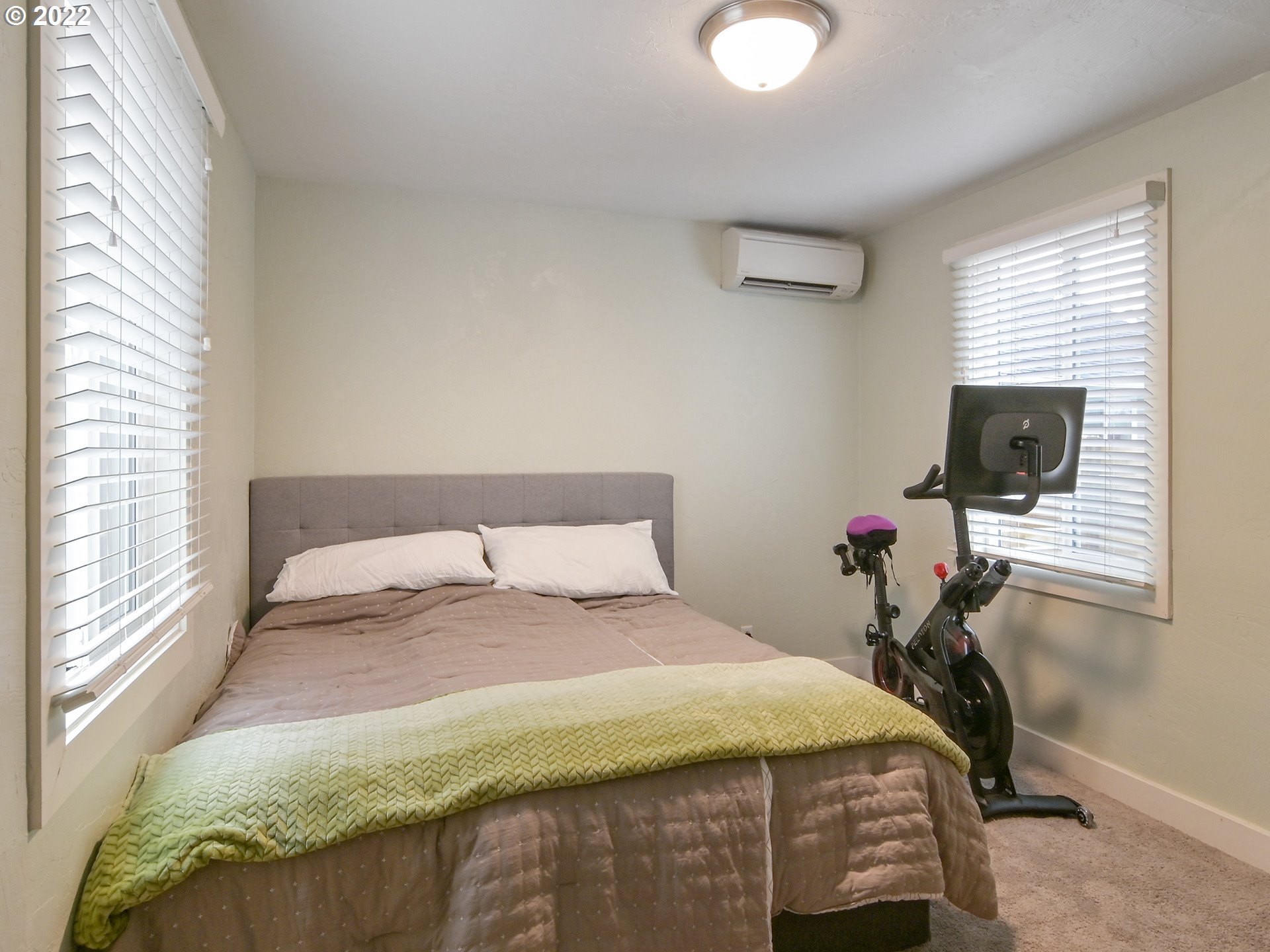 1704 H Street Springfield, OR 97477 - Photo 20 of 30 a bedroom with a bed and a tv