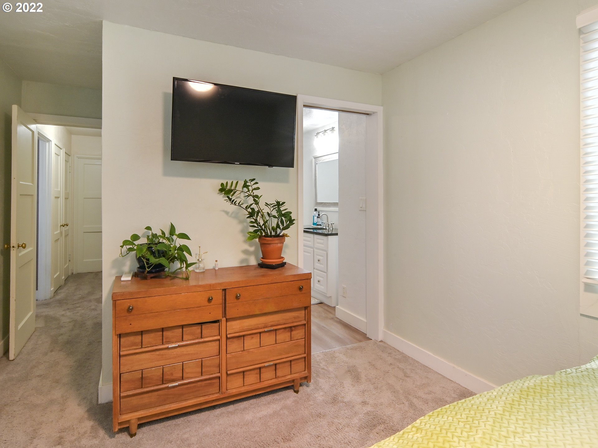 1704 H Street Springfield, OR 97477 - Photo 21 of 30 a living room with furniture and a flat screen tv