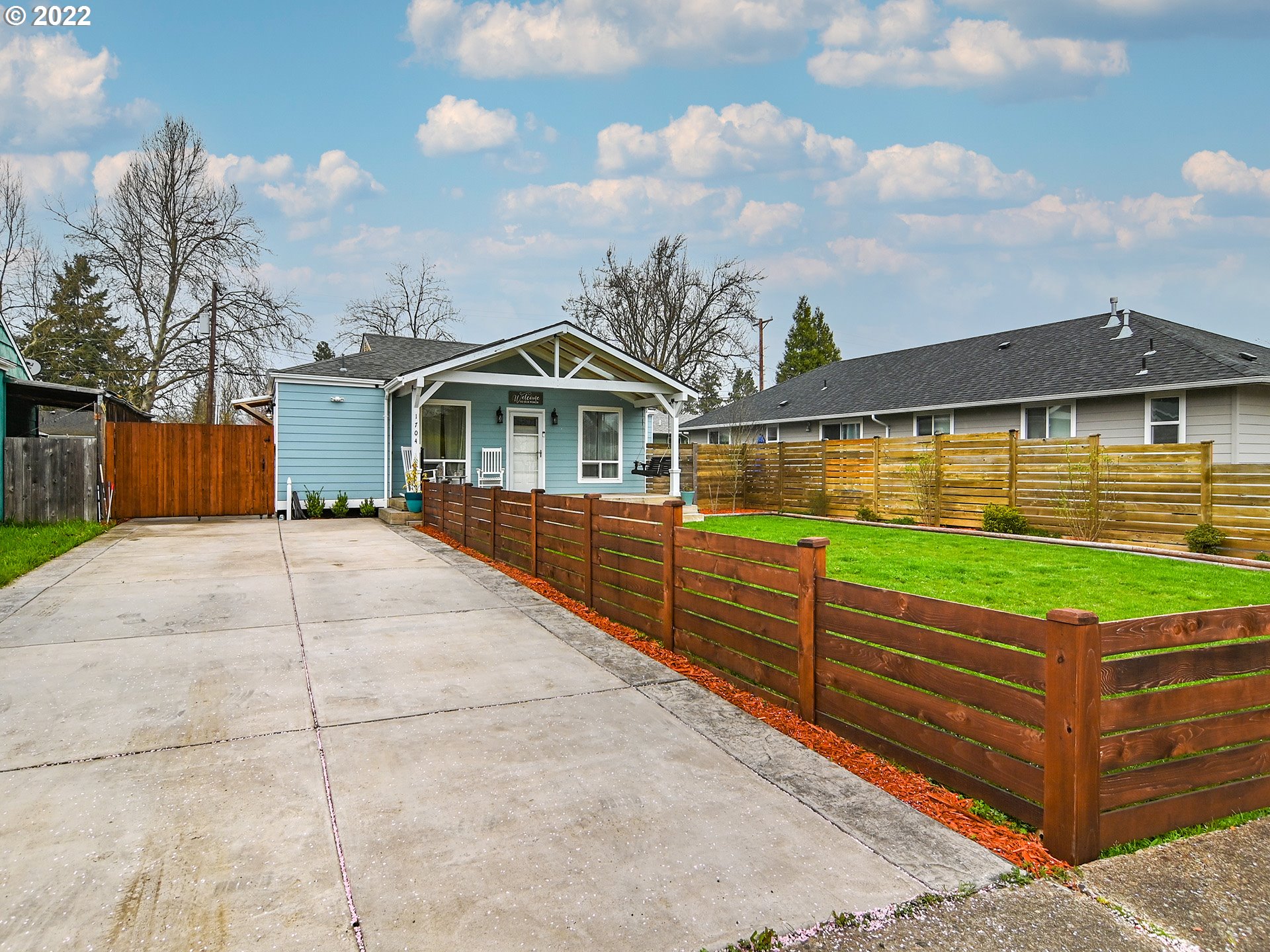 1704 H Street Springfield, OR 97477 - Photo 4 of 30 a view of a house with a yard
