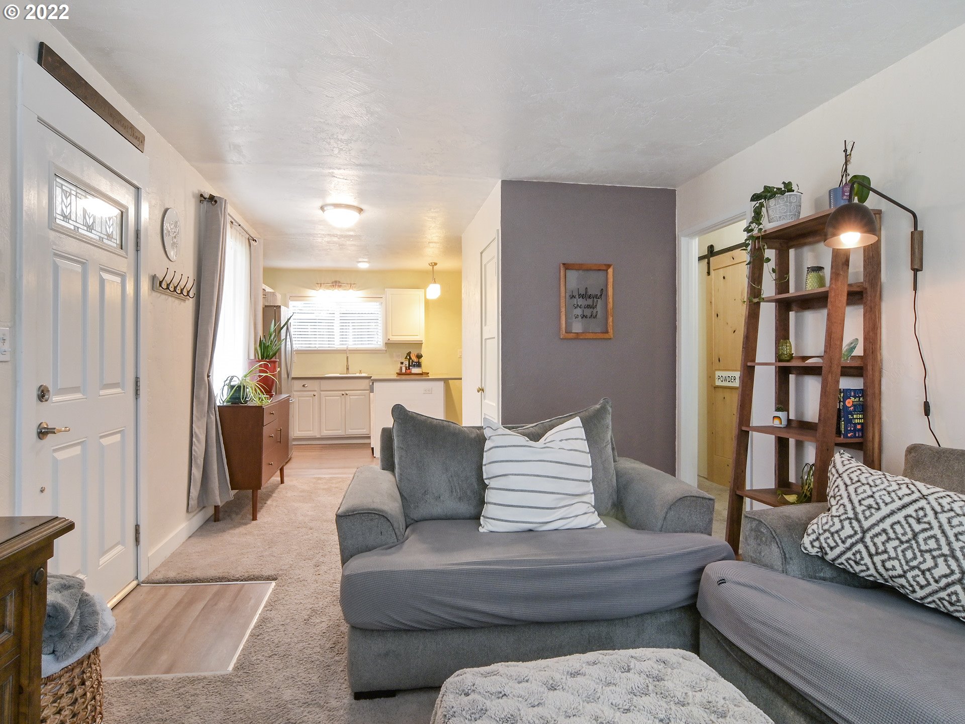 1704 H Street Springfield, OR 97477 - Photo 6 of 30 a living room with furniture and a wooden floor