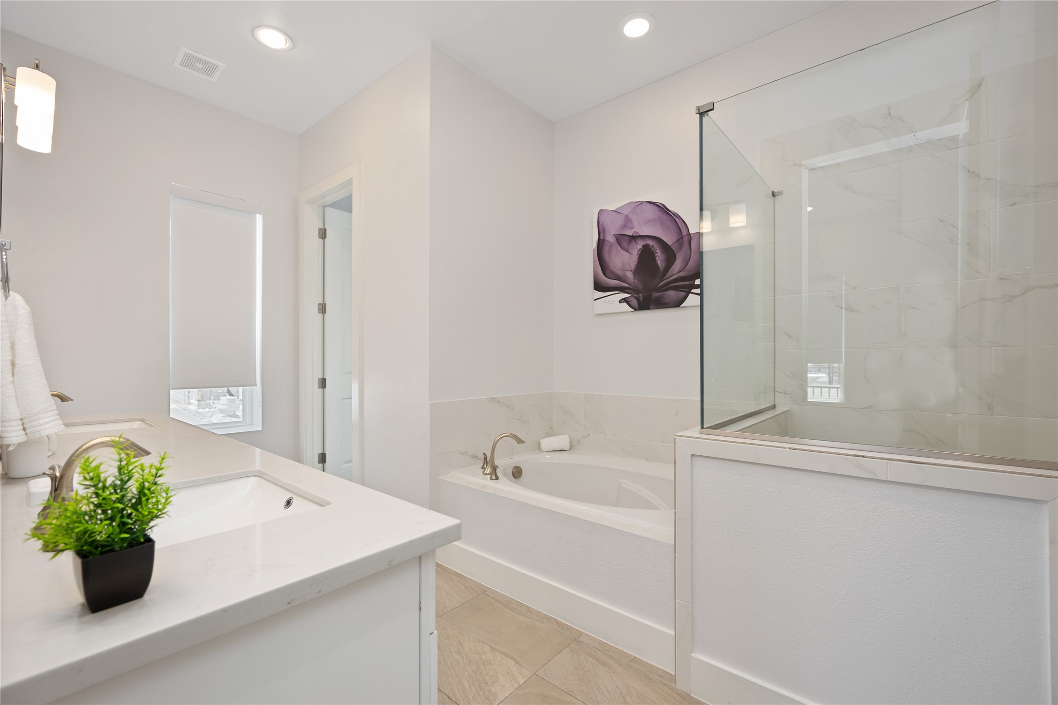 5914 Val Verde Street Houston, TX 77057 - Photo 13 of 25 a bathroom with a sink a toilet and shower
